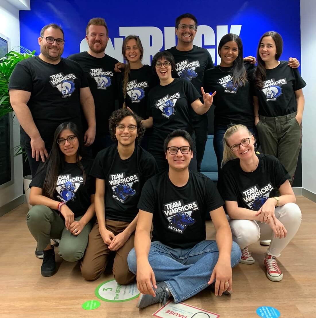 the ops team in the team warroris branded t-shirts